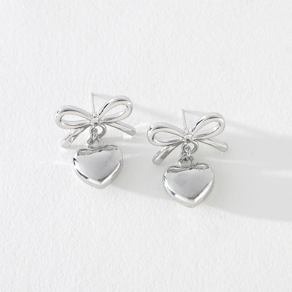 Juliet Bow Earrings with Heart Dangle in Silver