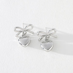 Juliet Bow Earrings with Heart Dangle in Silver