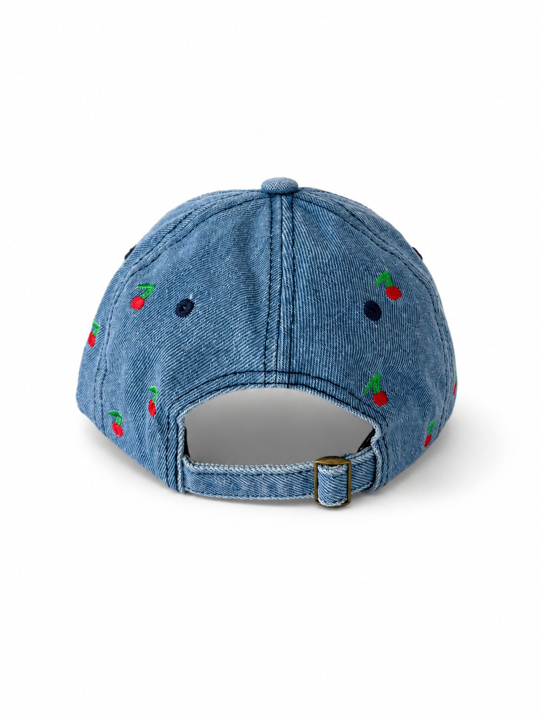 Mid-wash denim baseball cap embroidered with small red cherries, front view on a white background.