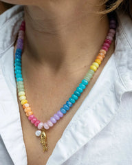 Fish & Pearl Necklace in Brights featuring a fish charm and bright pearl beads