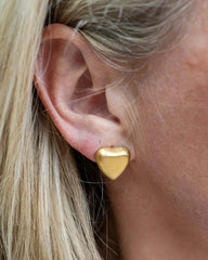 Matte gold heart stud earrings with a chocolate-box heart design