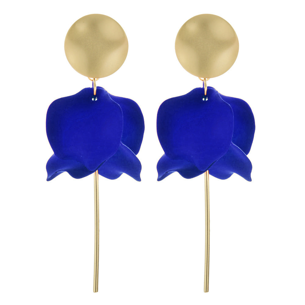 A pair of matte gold and bright blue flower petal dangle earrings with gold post.