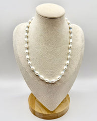Freshwater Pearl & Blue Crystal Necklace featuring genuine freshwater pearls and blue crystal beads