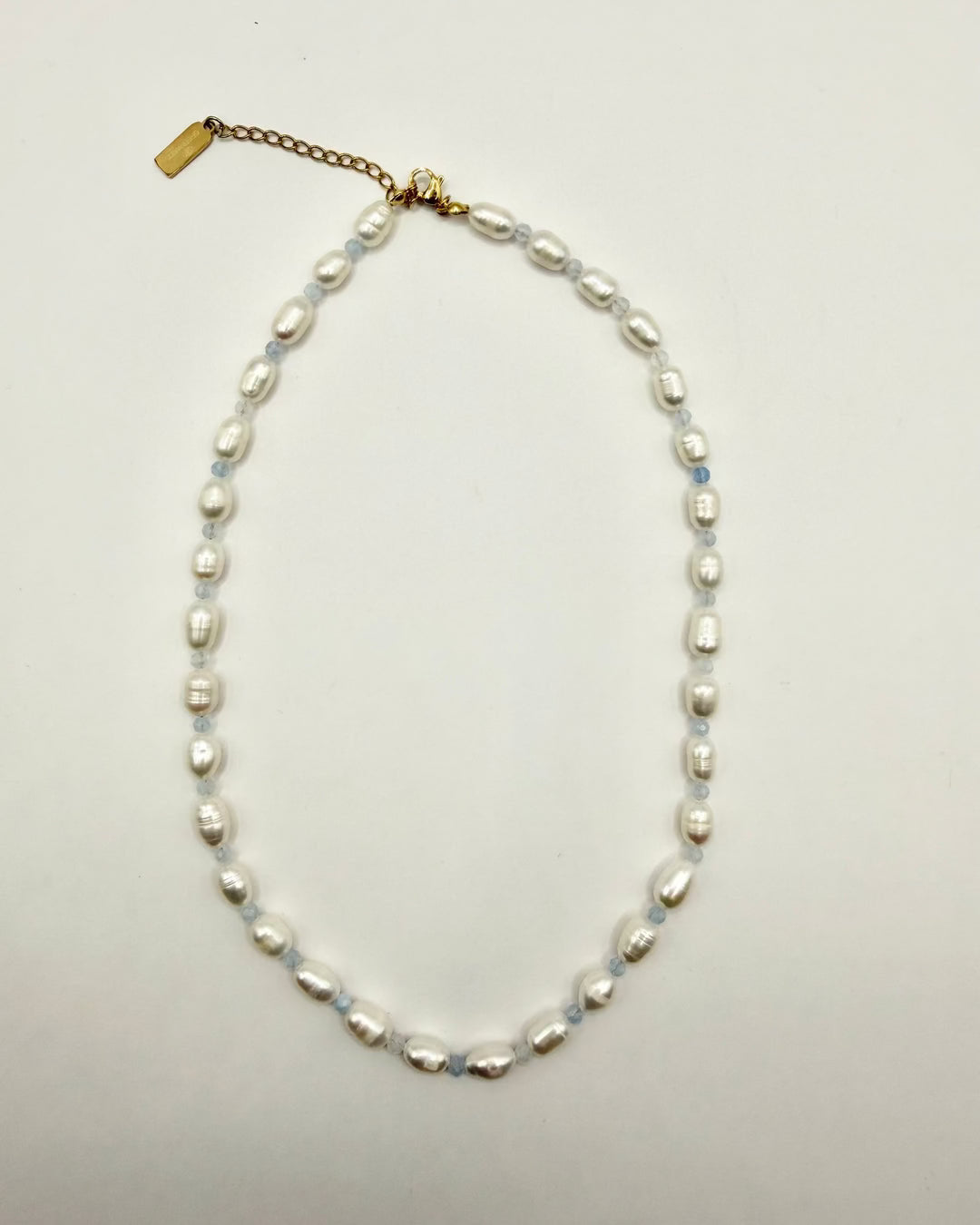 Close-up detail of the Freshwater Pearl & Blue Crystal Necklace