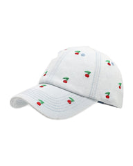 Light-wash denim baseball cap embroidered with small red cherries, front view on a white background.