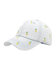 Light-wash denim baseball cap embroidered with small yellow lemons, front view on a white background.