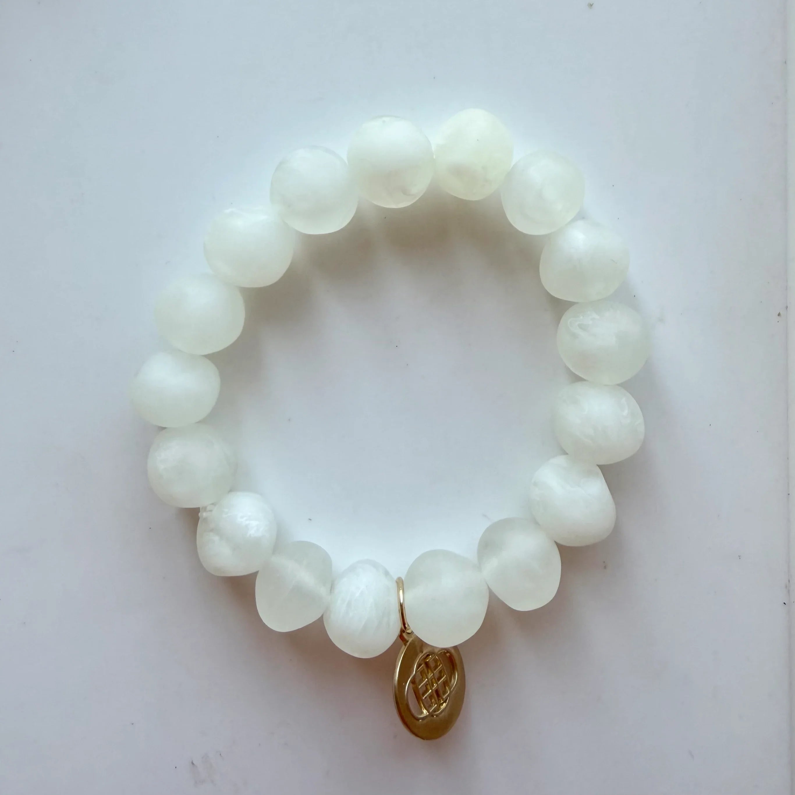 Matching bracelet included in the Pink and White Floral Pouch gift pack by Greenwood Designs
