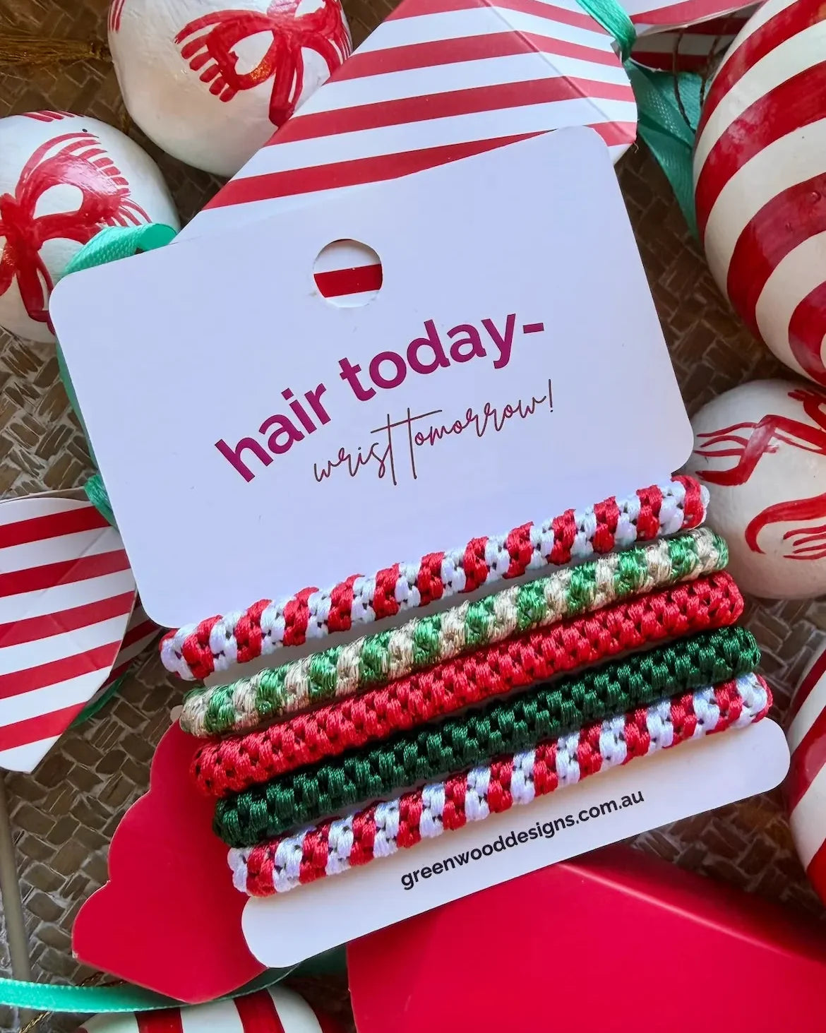 Candy Cane Christmas hair elastics by Greenwood Designs, set of five festive hair ties in red, green and gold, perfect for Christmas gifting and stocking fillers.