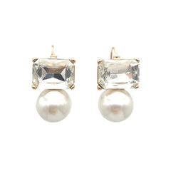 A pair of gold-plated earrings featuring a rectangular clear crystal above a faux pearl